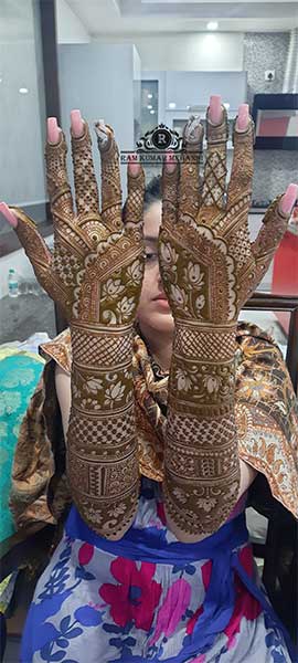 Backhand finger mehndi design